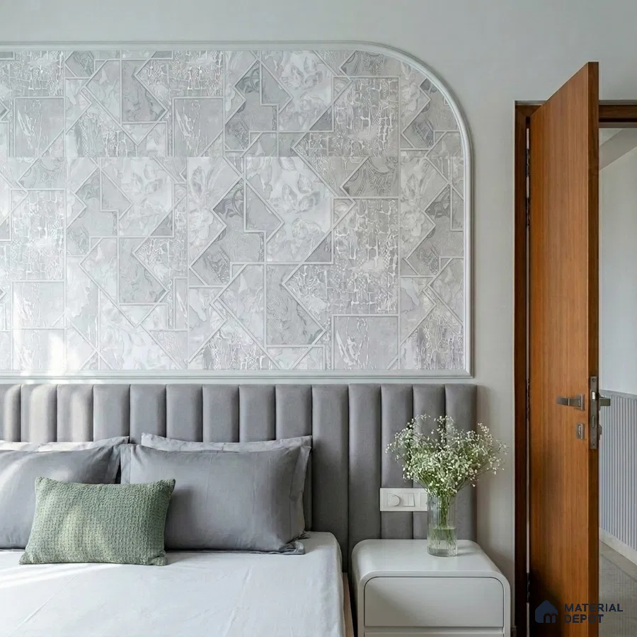 Minimalist bedroom with geometric textured wallpaper and grey suede upholstered headboard