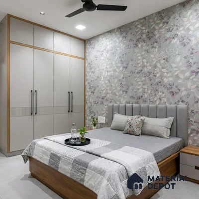 Modern bedroom with floral wallpaper, grey solid laminate wardrobe, and wooden bed frame