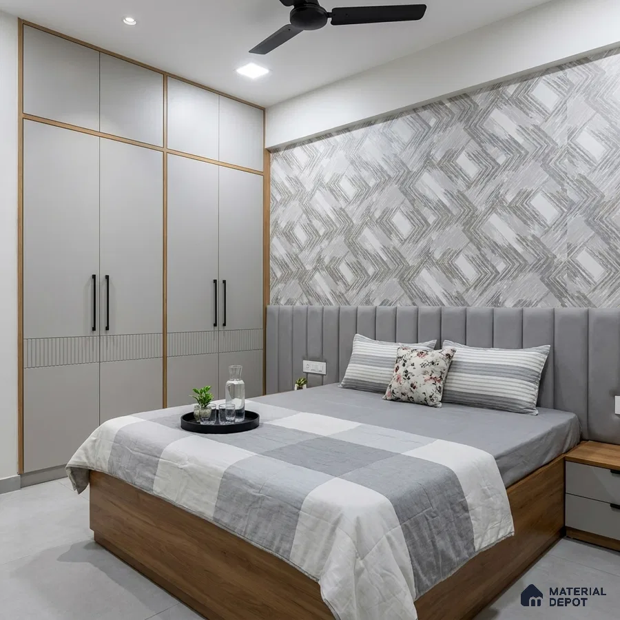 Modern bedroom with grey geometric wallpaper, light grey laminate wardrobe, and wood finish bed