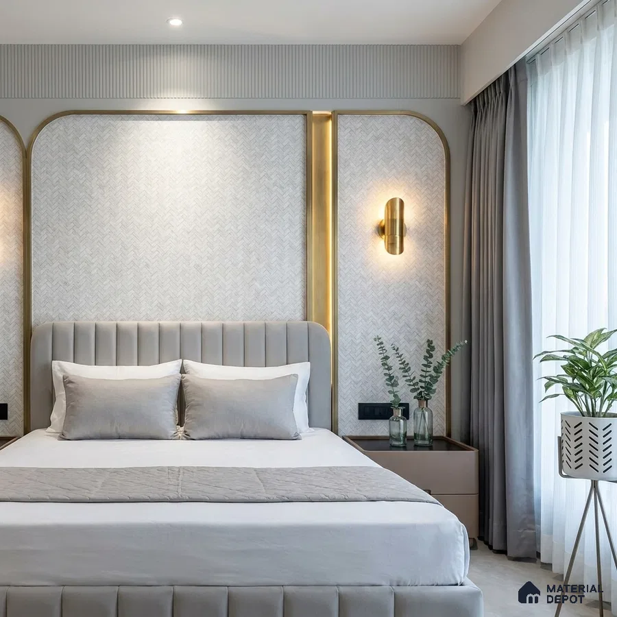 Modern bedroom with suede upholstered bed, gold accent profiles, and textured wallpaper