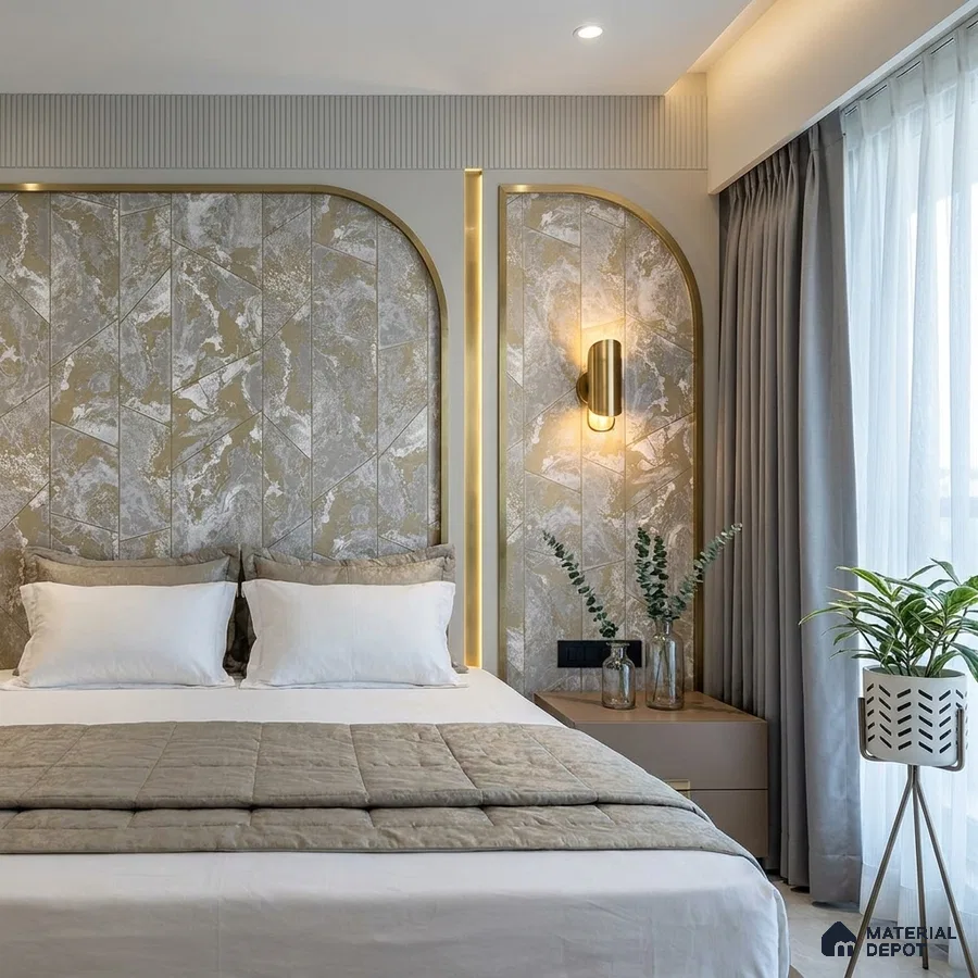 Modern bedroom with marble-look wall panels, gold accent trims, and taupe upholstery