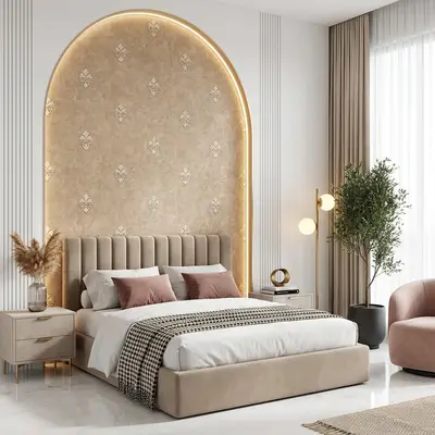 Modern bedroom with suede upholstered bed, beige damask wallpaper, and marble floor tile