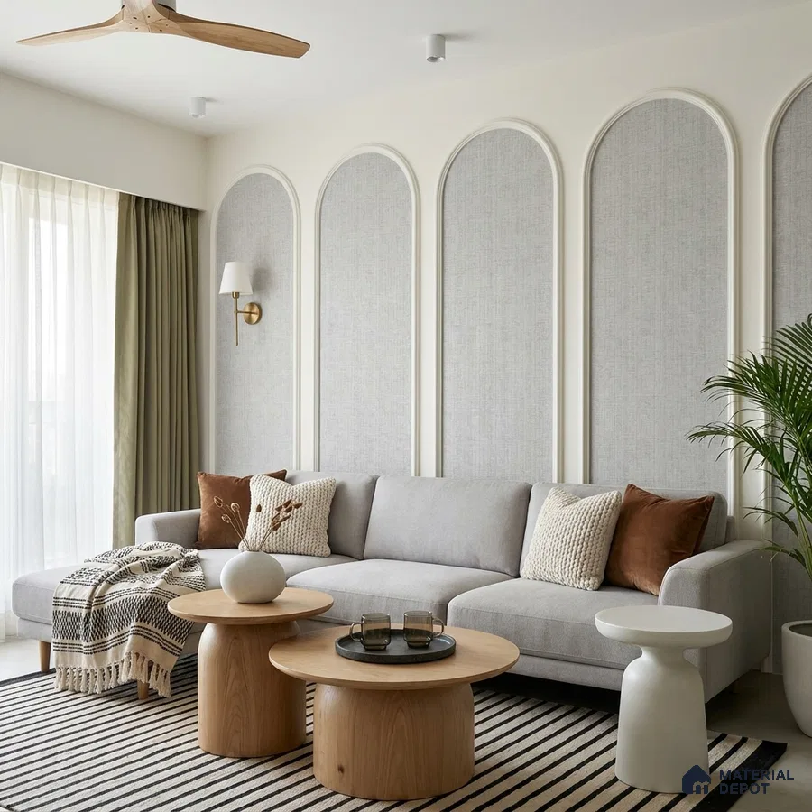Scandinavian living room with fabric wall panels, light oak coffee tables, and neutral palette