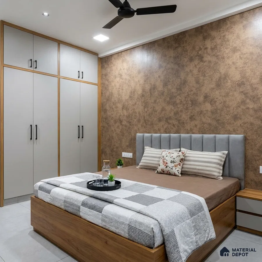 Modern bedroom with matte beige textured wall, grey upholstered headboard, and light wood wardrobe