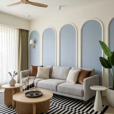 Scandinavian living room with powder blue fabric wall panels and light oak coffee tables