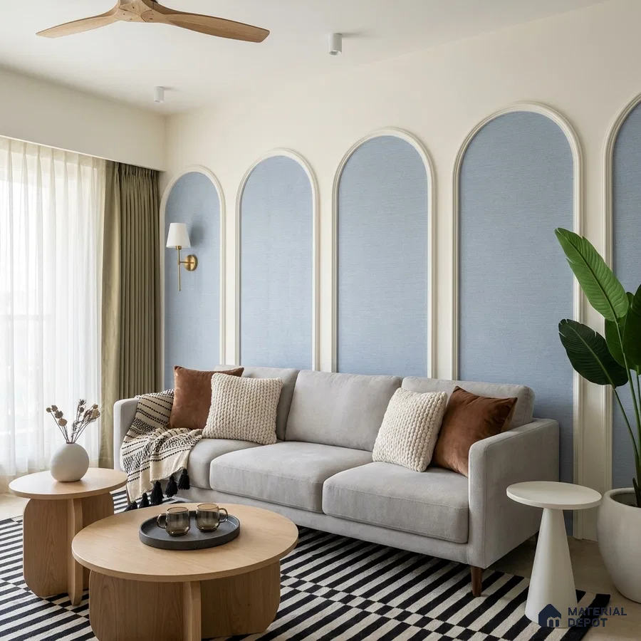 Scandinavian living room with powder blue fabric wall panels and light oak coffee tables