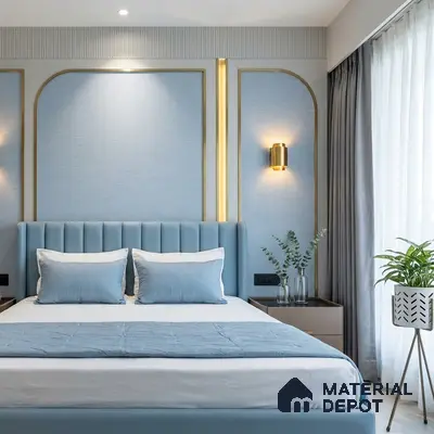 Modern bedroom with powder blue upholstered bed, textured blue wallpaper, and gold accent wall panels