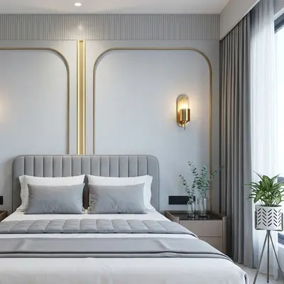 Modern bedroom with suede upholstered headboard, grey fluted wall panels, and soft neutral palette