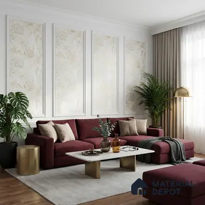 Modern living room with burgundy velvet sofa, gold accent tables, and beige floral wallpaper panels