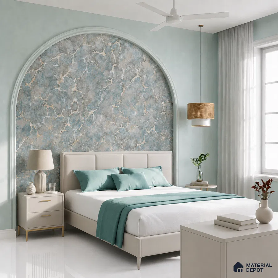 Modern bedroom with blue marble-effect wallpaper accent, white upholstered bed, and pastel blue wall paint