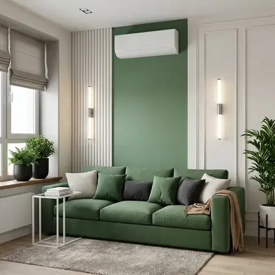 Modern living room with sage green wall paint, green fabric sofa, and fluted wall panels