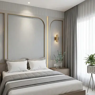 Modern bedroom with grey fabric wall panels, gold accent trims, and soft neutral palette