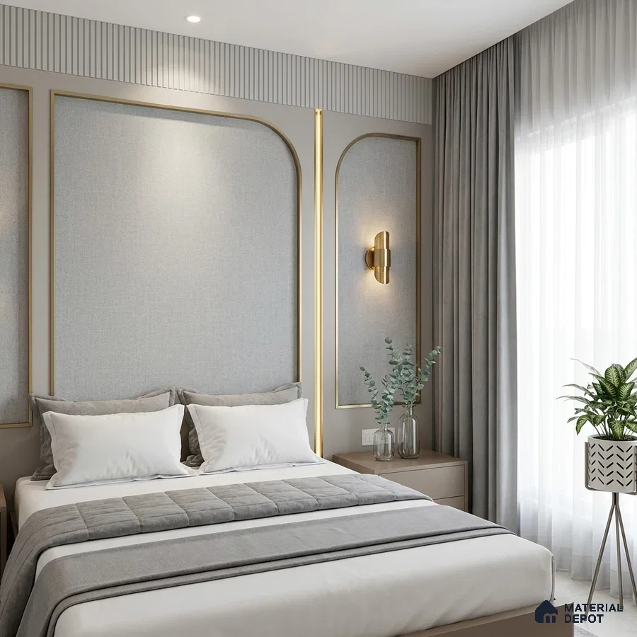 Modern bedroom with grey fabric wall panels, gold accent trims, and soft neutral palette