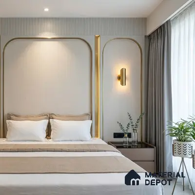 Modern bedroom with beige fabric wall panels, gold accent trims, and neutral palette