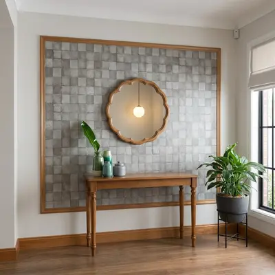 Modern foyer with grey checkerboard wall tiles and natural wood console table