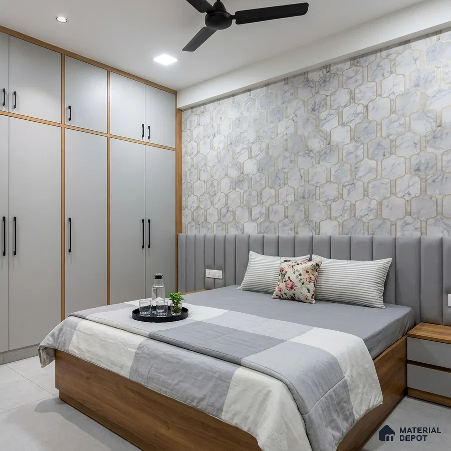 Modern bedroom with grey matte laminate wardrobe, marble geometric wallpaper, and wood finish bed