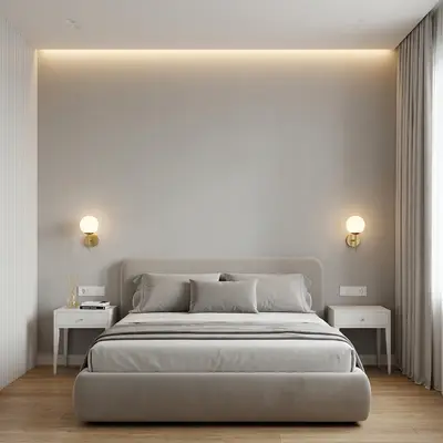 Minimalist bedroom with suede upholstered bed, light grey wall panels, and natural wood flooring