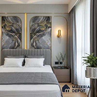 Art Deco bedroom with gold-accented abstract wallpaper, grey upholstered bed, and light wood flooring